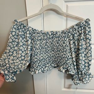 Blue floral smocked top. Can be worn off the shoulder or on.